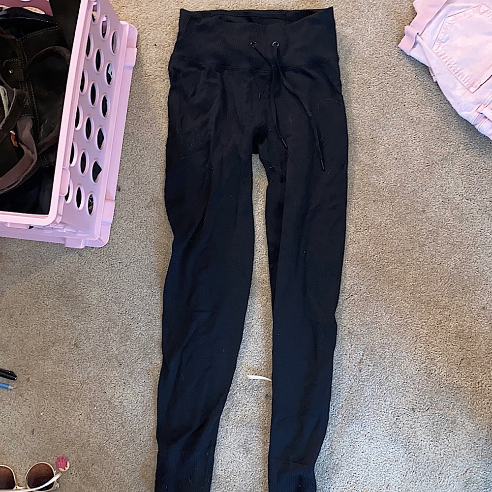 black; pink leggings